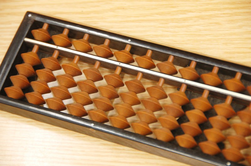 A four-beads abacus was considered